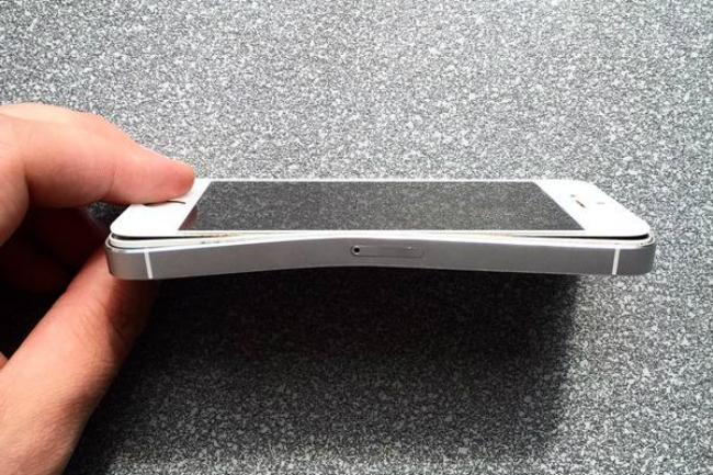 iphone 5s saves man metal bar s life