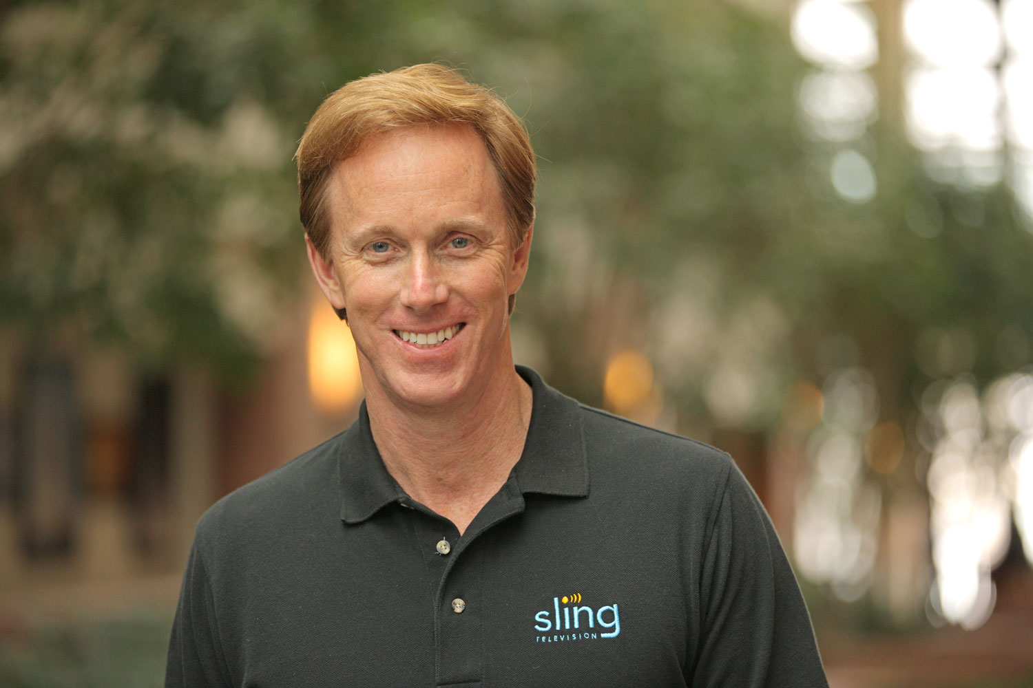 sling tv ceo blasts comcast data caps roger lynch executive