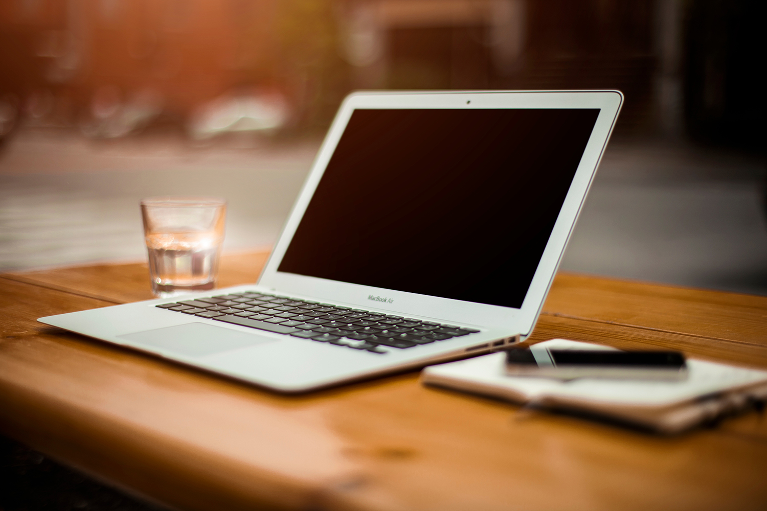 The MacBook Air sitting on a table.