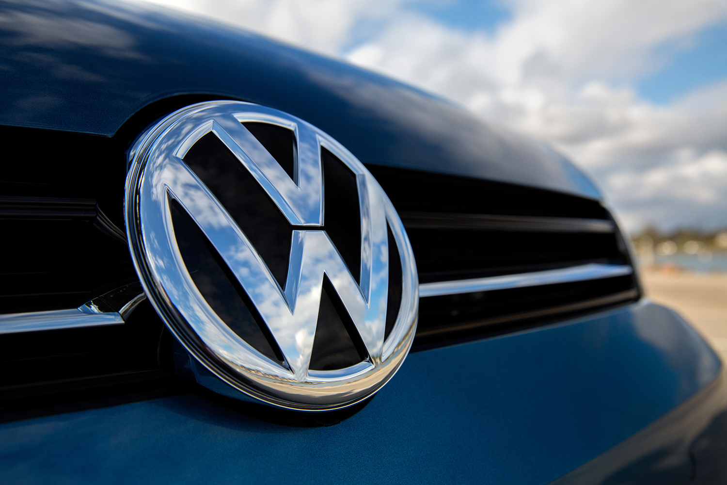 volkswagen executive bonus cuts emblem