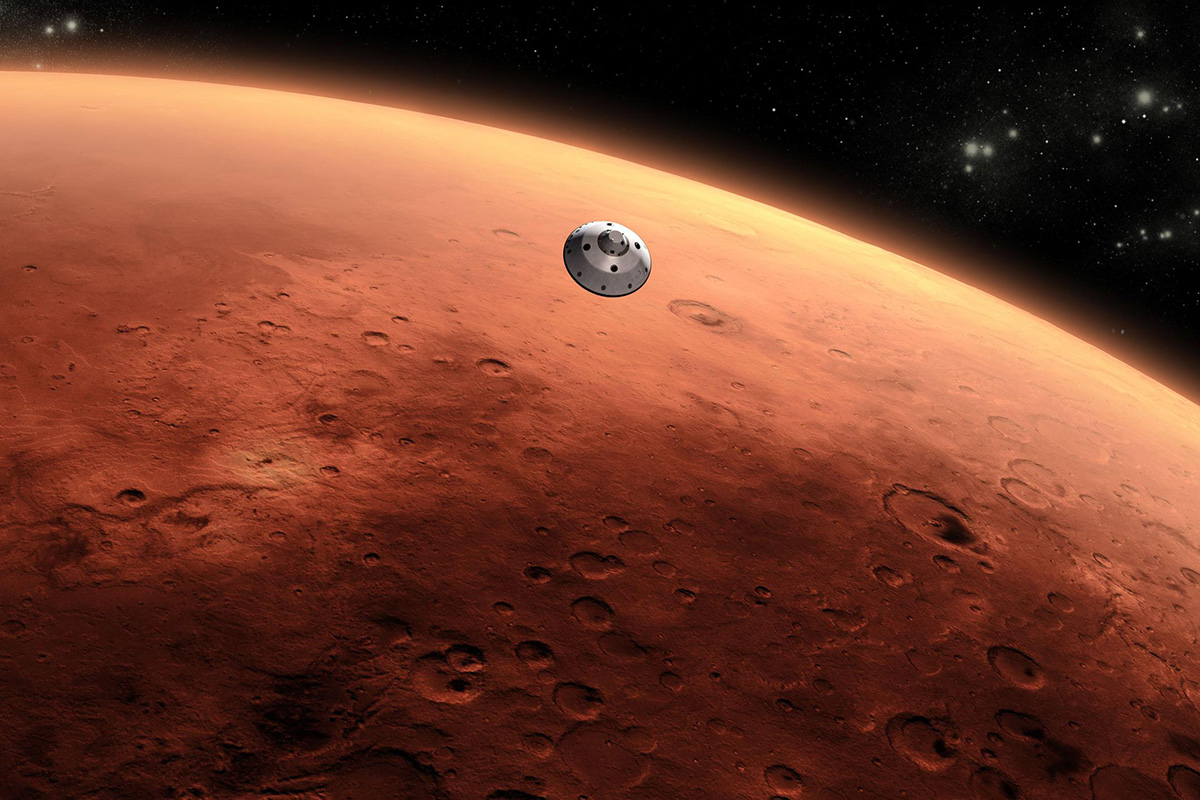 A spacecraft above Mars.