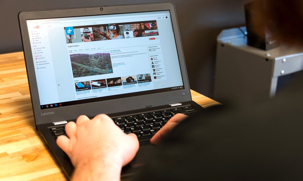 A person using the Lenovo Thinkpad-13 Chromebook.