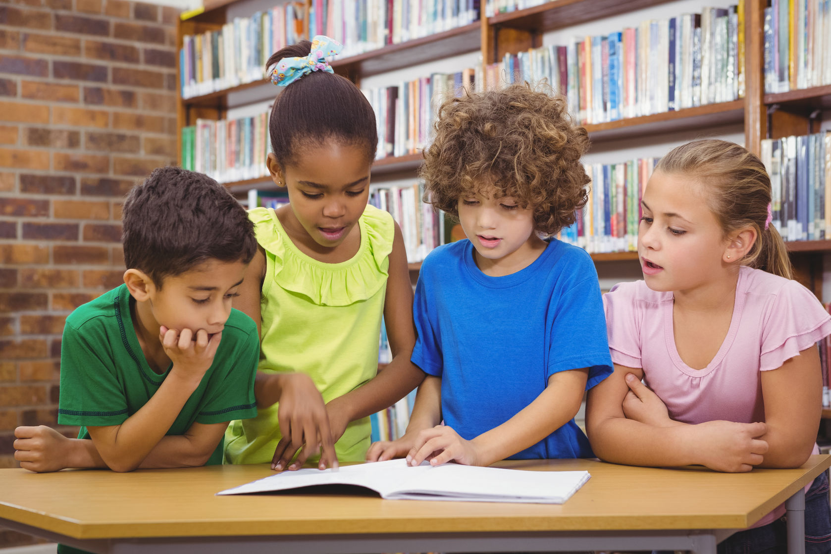 irummage belle pan young entrepreneur 43914148  students reading froma school book at the elementary