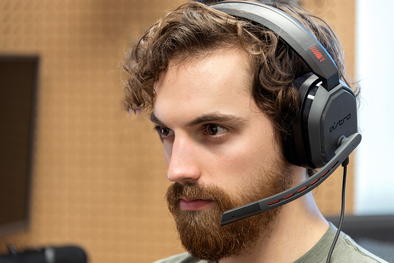 Man wearing Astro A10 headset.