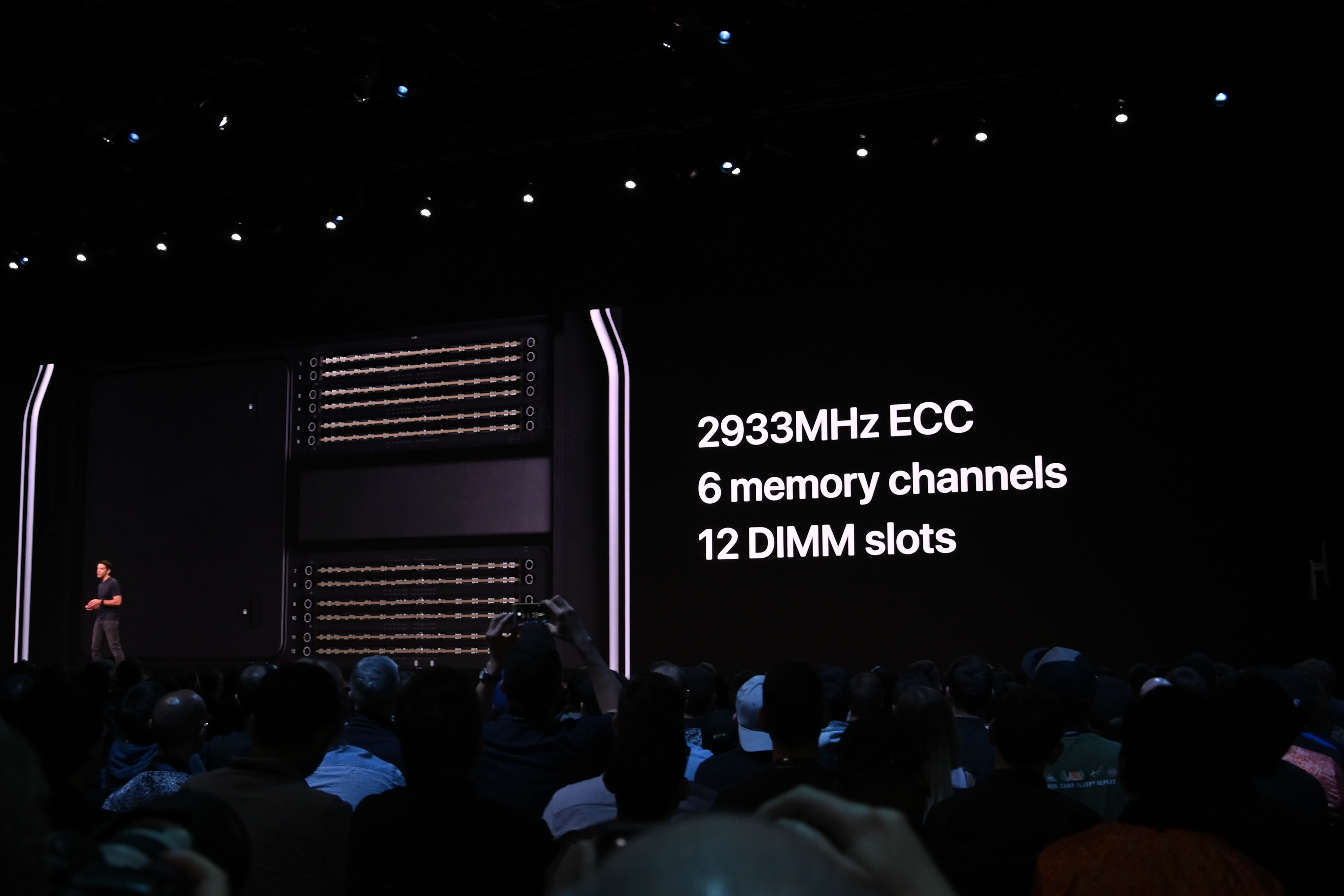 Screen at WWDC 2019 showing Mac Pro with audience watching.