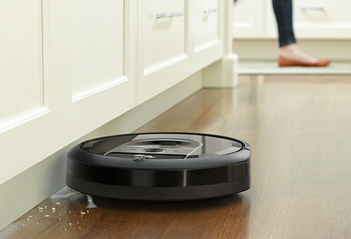 irobot slashes 150 off i7 best roomba robot vacuum that empties itself  charcoal photo insitu edgesweeping wood crumbs