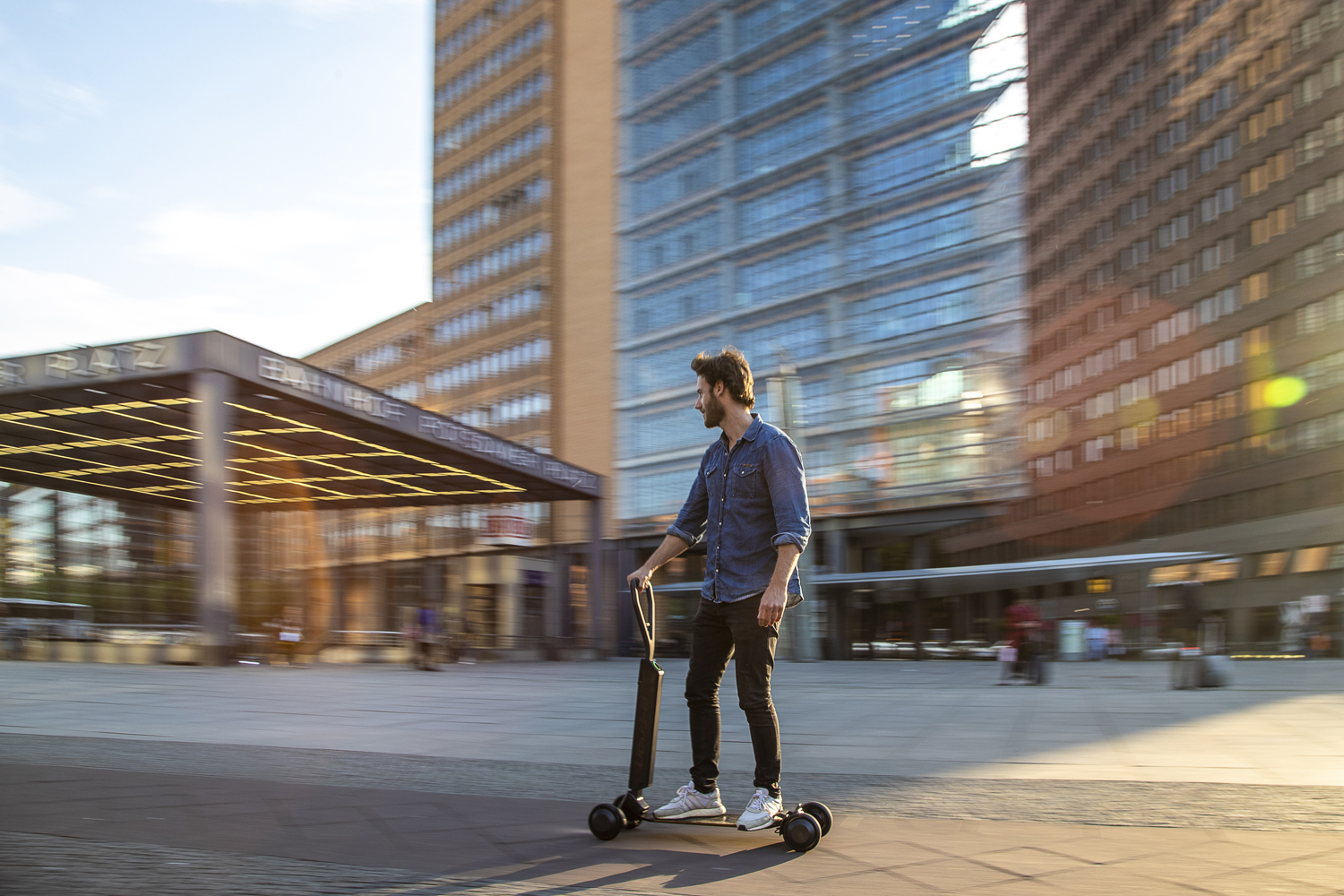 audi shows e tron scooter four wheeled electric skateboard concept combines with