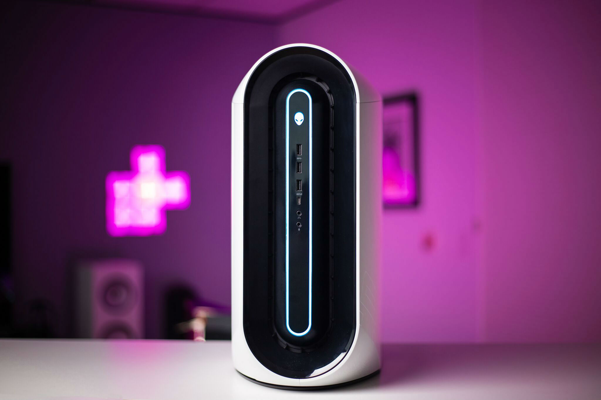 The Alienware Aurora R10 Ryzen Edition Gaming Desktop, placed on a desk.