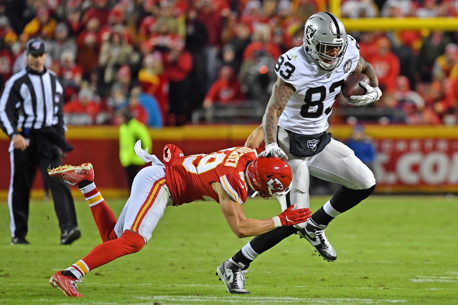 The NFL's Daniel Sorensen tries to tackle Darren Waller