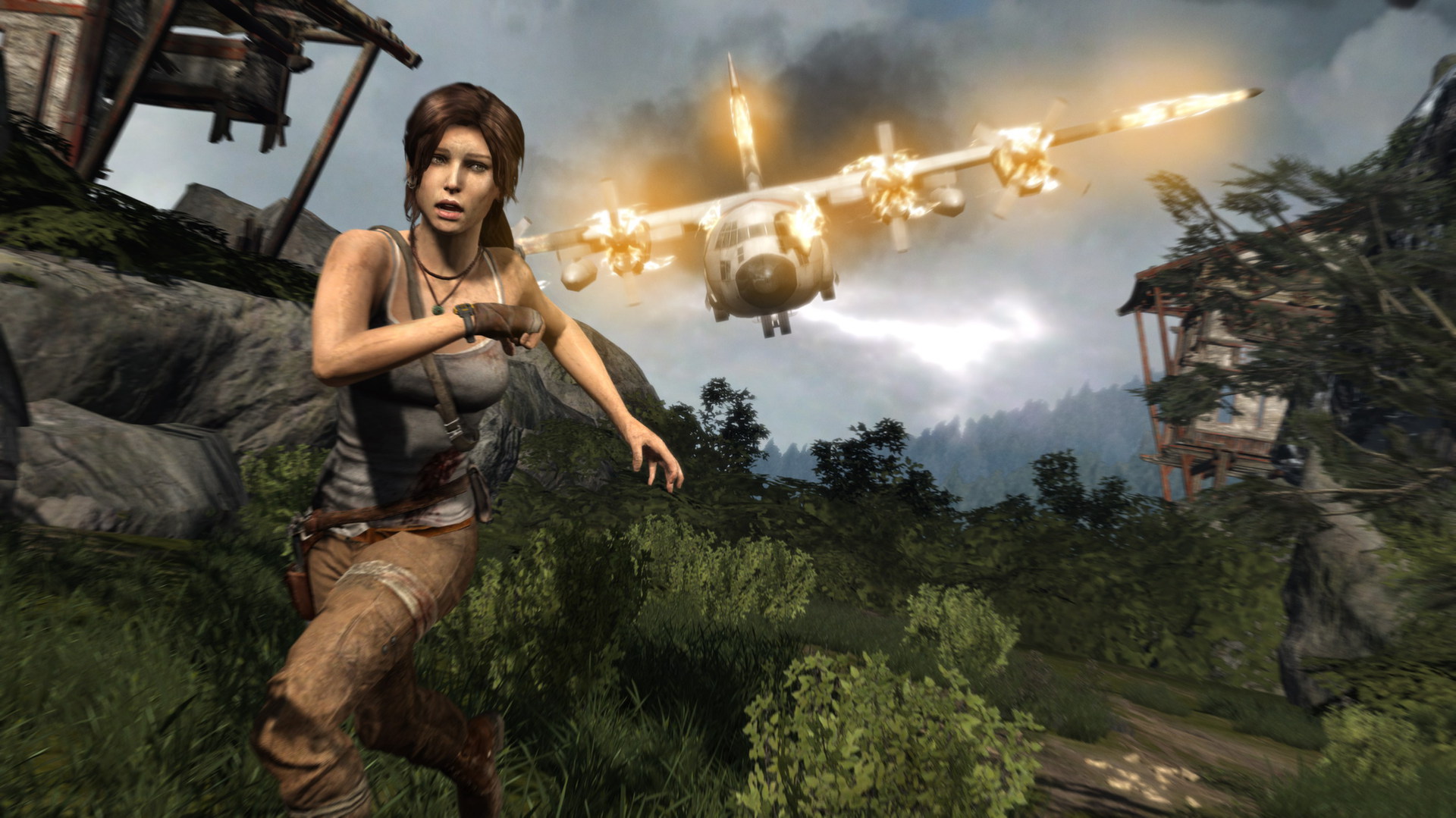 Lara Croft runs from a crashing plane in Tomb Raider.