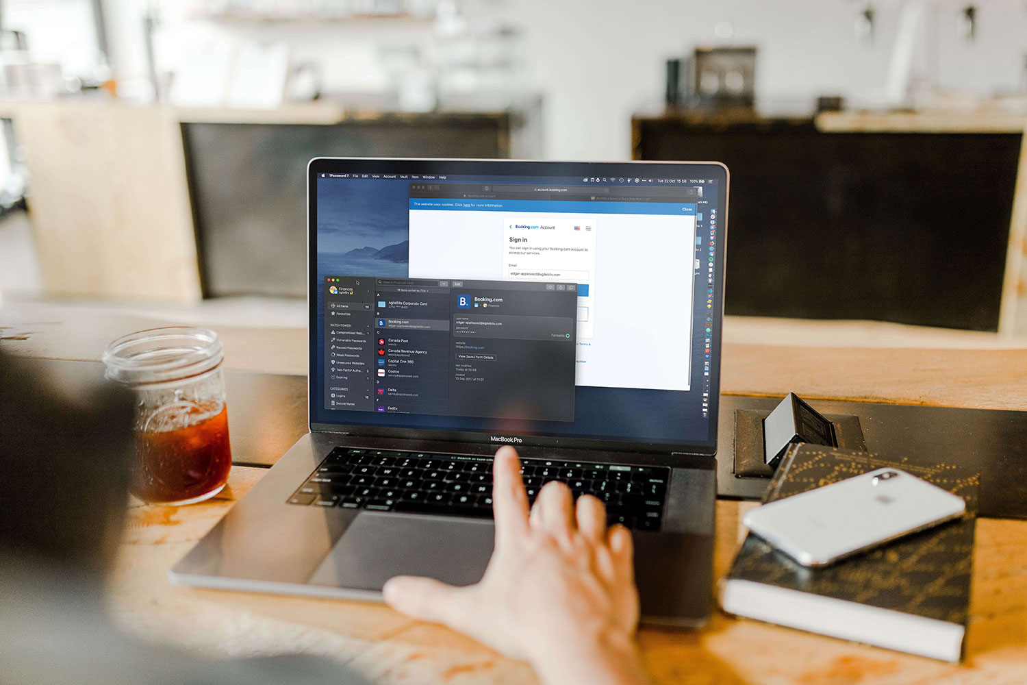 A laptop screen showing the 1Password password manager.