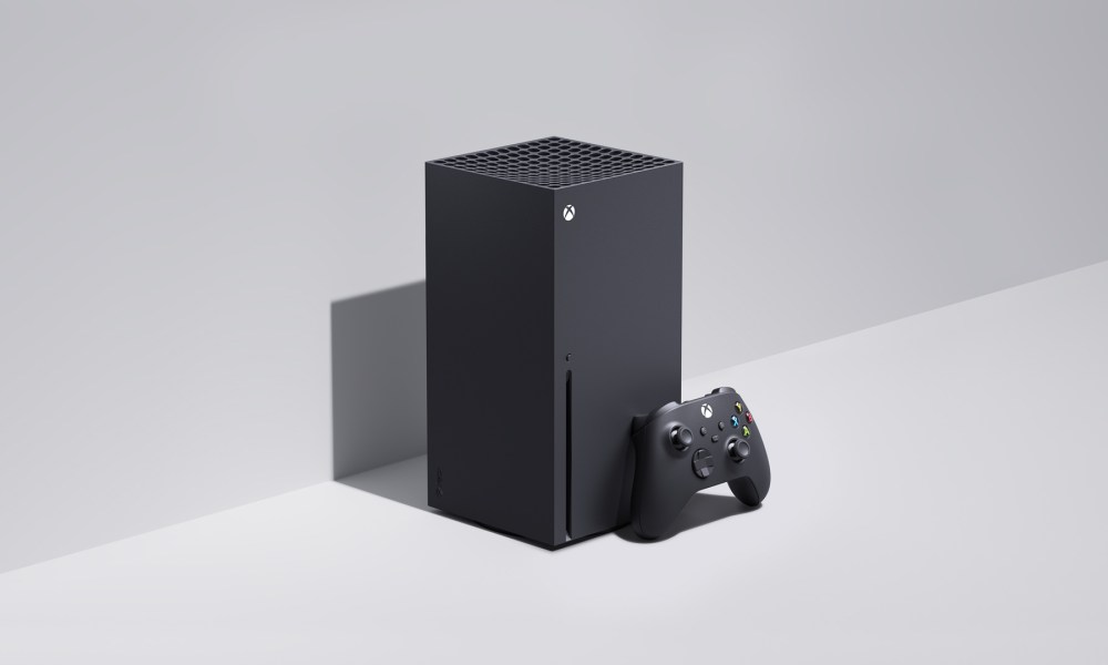 Xbox Series X sitting against a wall.