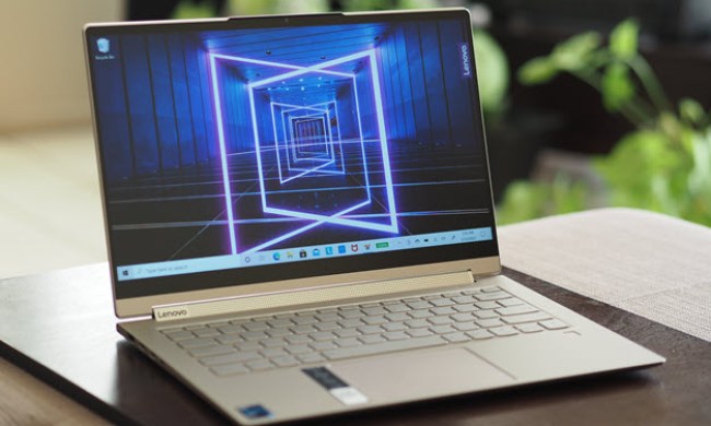The Lenovo Yoga 91 laptop with the screen showing a scene with lasers.