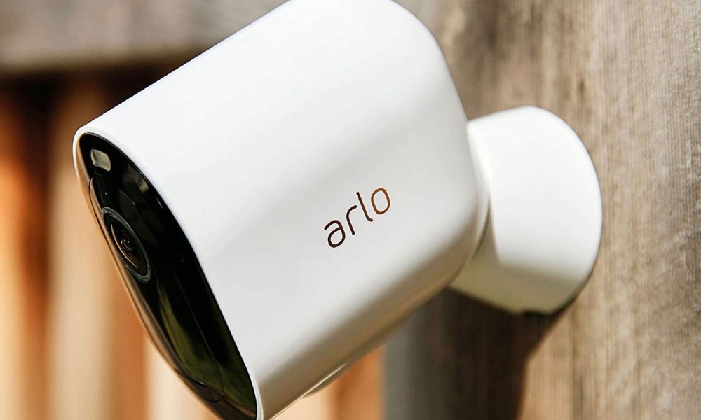 The Arlo Pro 4 home security camera installed outdoors.