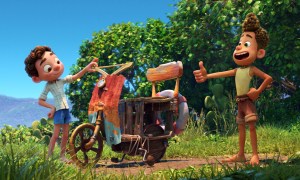 Luca and Alberto give a thumbs-up sign to their homemade Vespa scooter in a scene from Pixar's Luca.