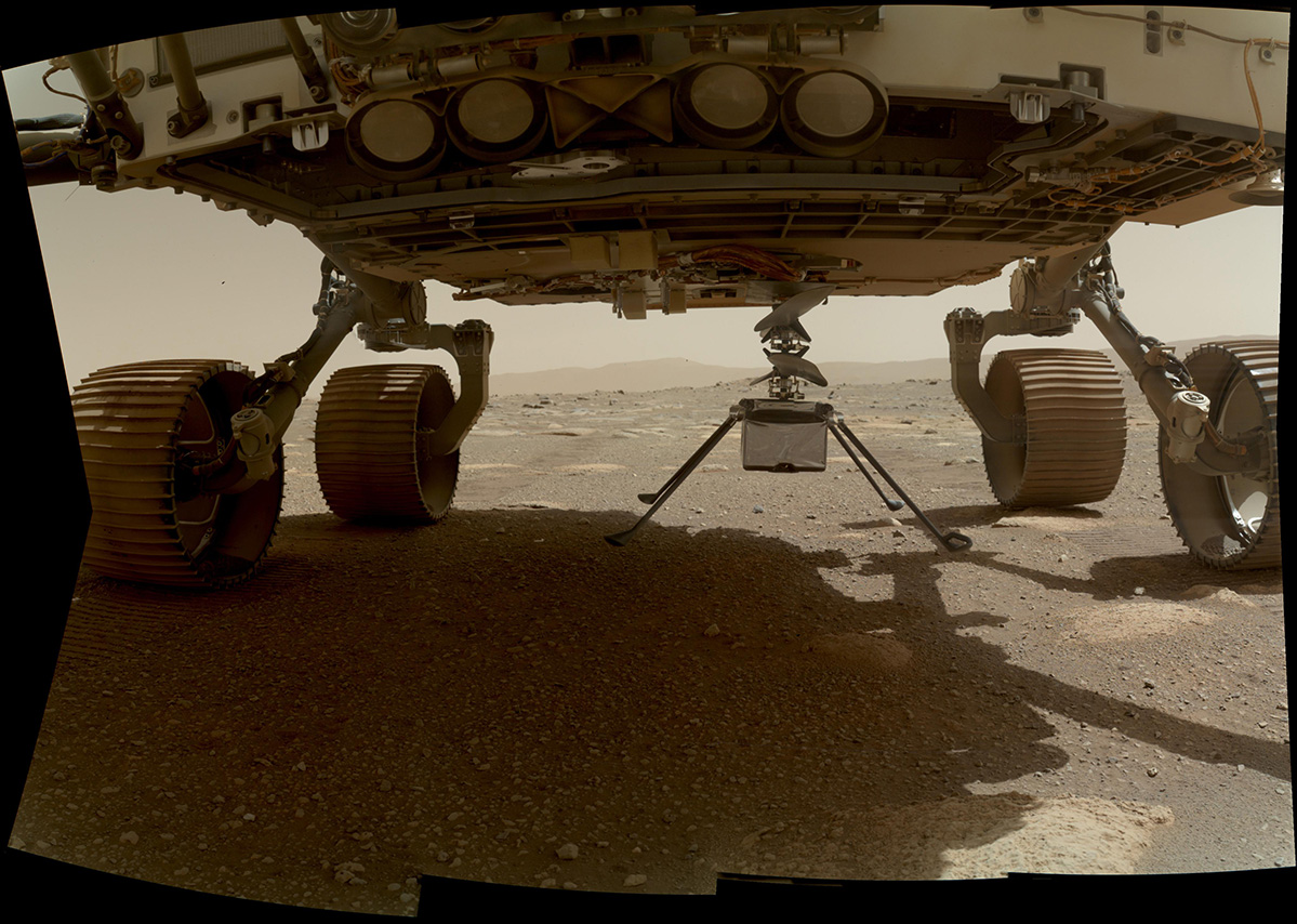 NASA's Ingenuity helicopter can be seen here with all four of its legs deployed before dropping from the belly of the Perseverance rover on March 30, 2021, the 39th Martian day, or sol, of the mission.