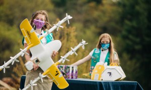 Girl scouts and Wing delivery drones.