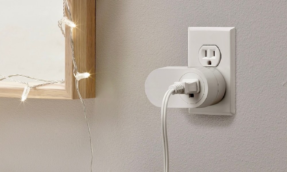 Tradfri smart plug connected to a bathroom outlet.