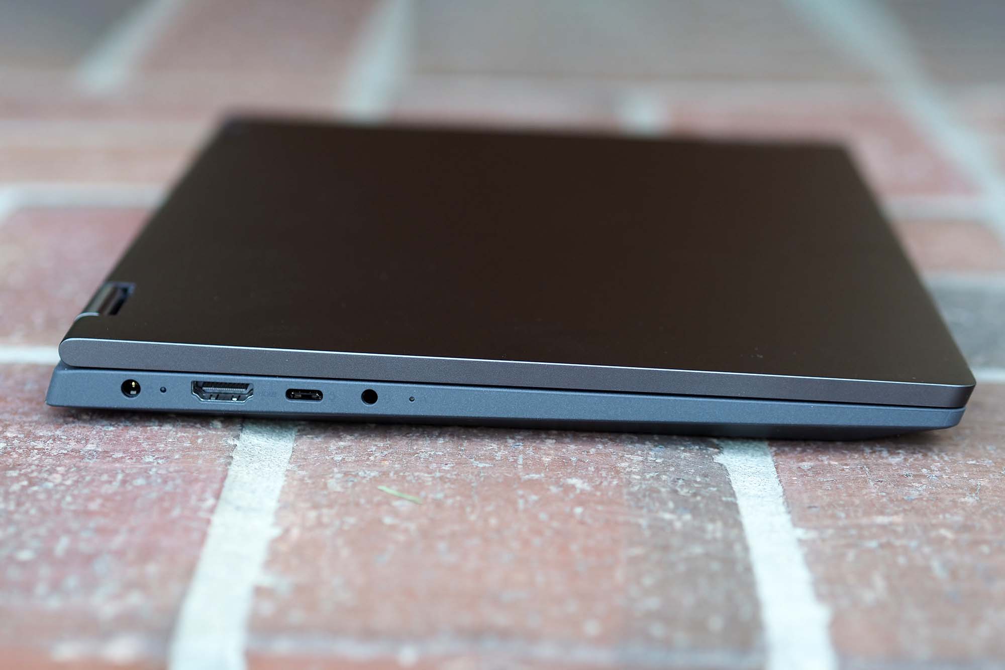 Charging port, micro USB port, HDMI port, and headphone jack on the left side of the Lenovo IdeaPad Flex 5i 14.