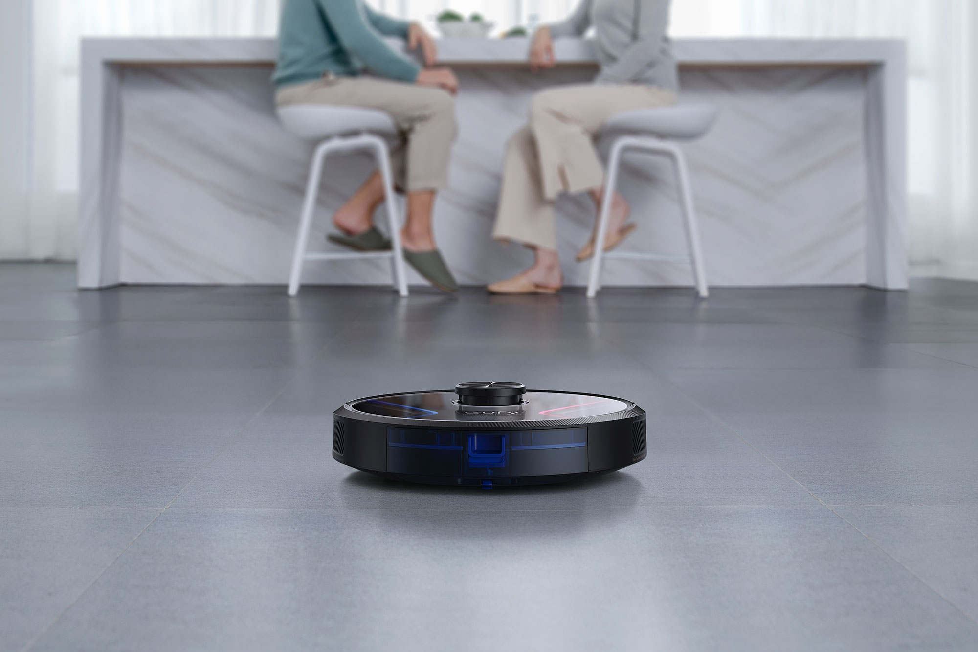 Eufy RoboVac X8 robot vacuum cleaner on grey floor.