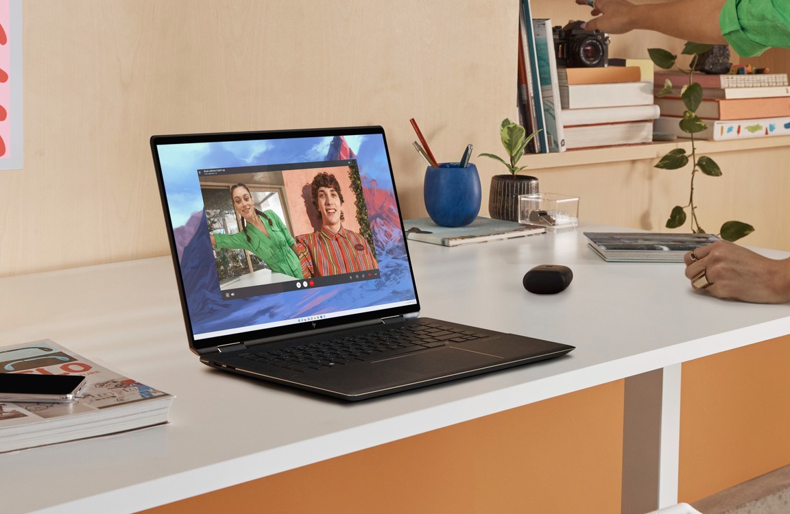 The HP Spectre x360 16 on a white desk.