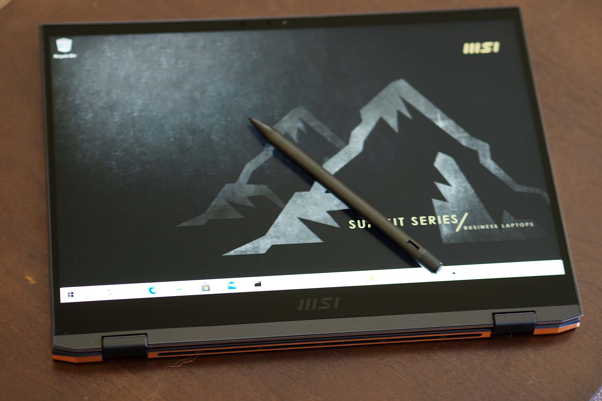 MSI Summit E13 Flip Evo sitting on table in tablet fold.