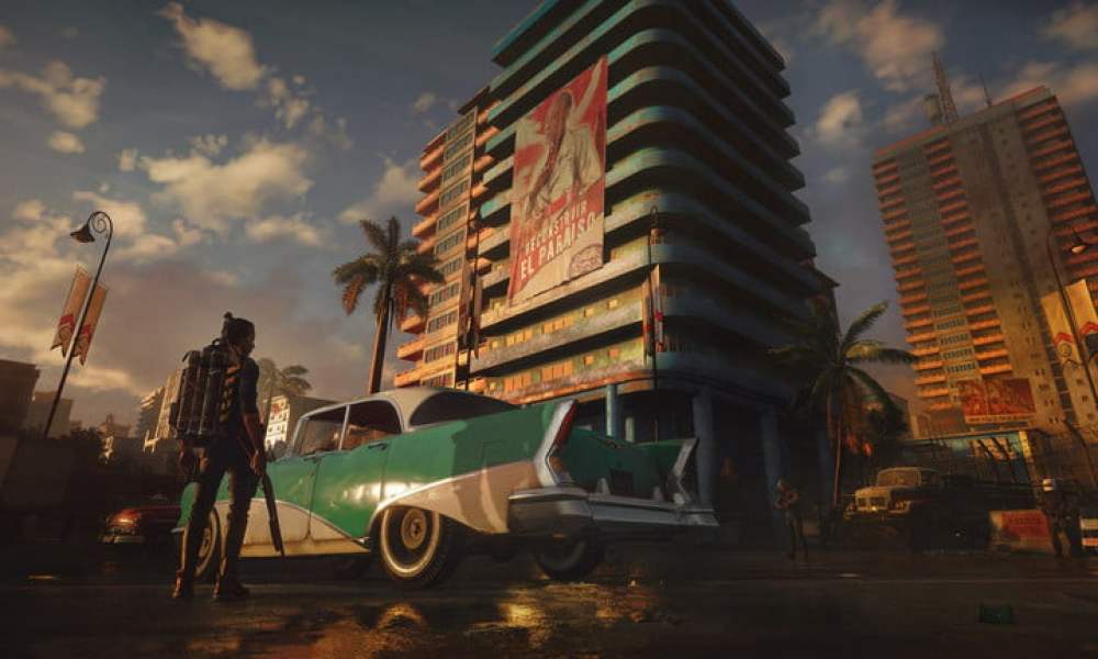 A car and a big building in Far Cry 6.