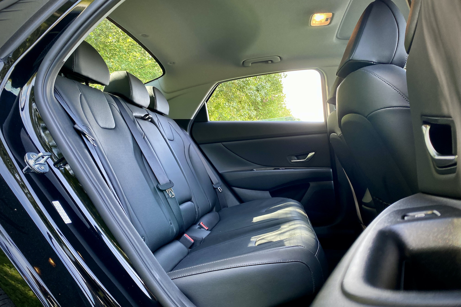 Rear seats in the 2021 Hyundai Elantra Hybrid from passenger side.