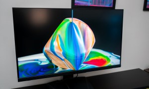 Paint pouring over a cube on the MSI Optix MPG 32 QD.