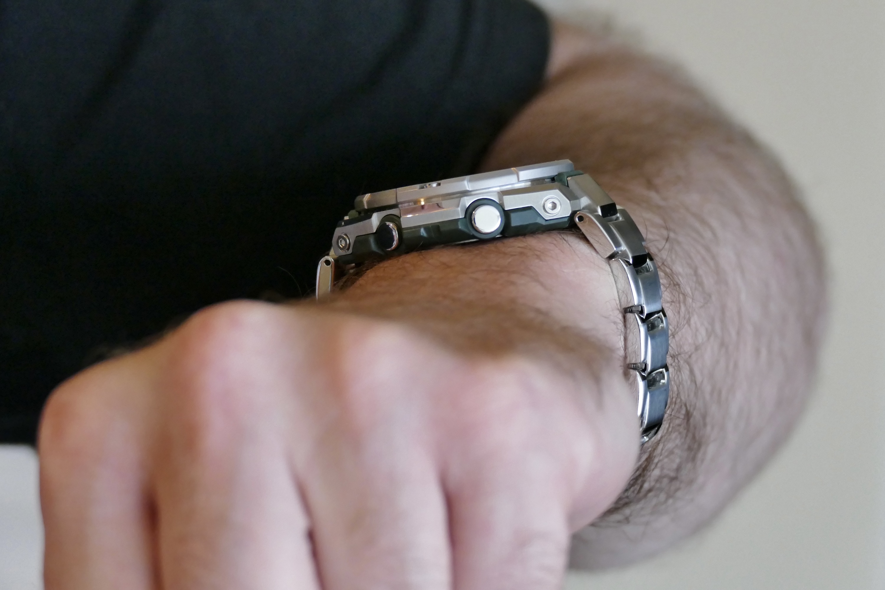 Casio G-Shock GST-B500 seen from the side on a mans wrist.