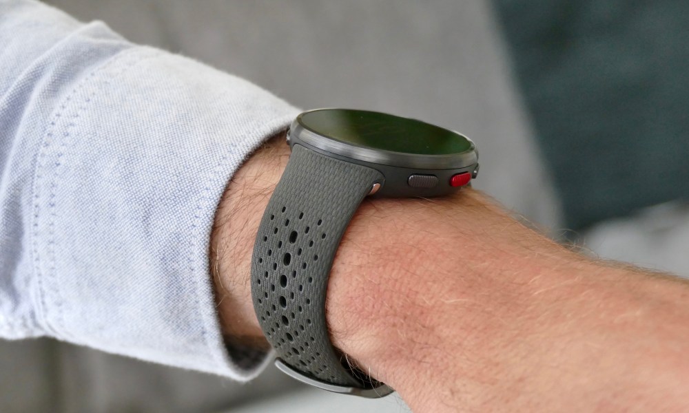 Polar Pacer Pro on man's wrist, seen from the side.