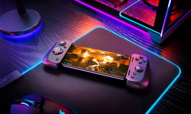 The Razer Kishi V2 holds a phone playing Cyberpunk 2077.