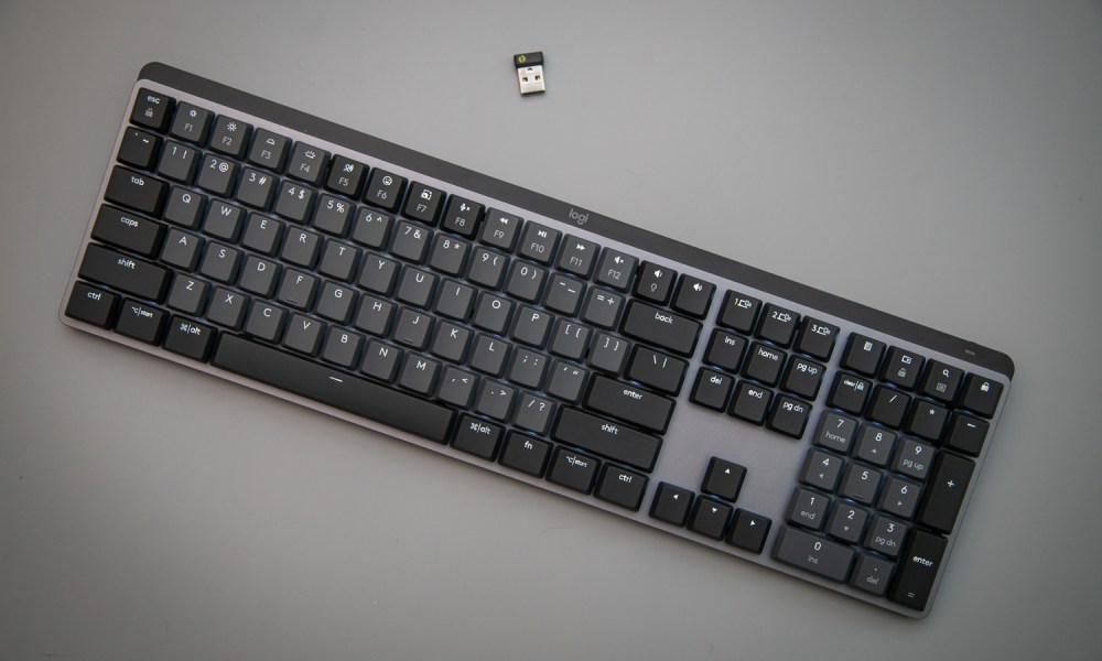 Logitech MX Mechanical keyboard on a gray background.