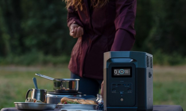 EcoFlow DELTA 2 on table at campsite for quick charging.