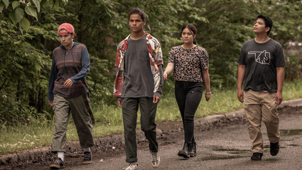 Four main teenage characters from Reservation Dogs walking down the street.