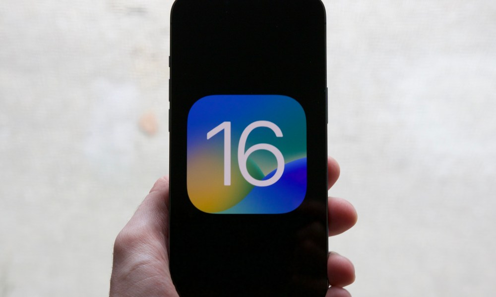 The iOS 16 logo on an iPhone.