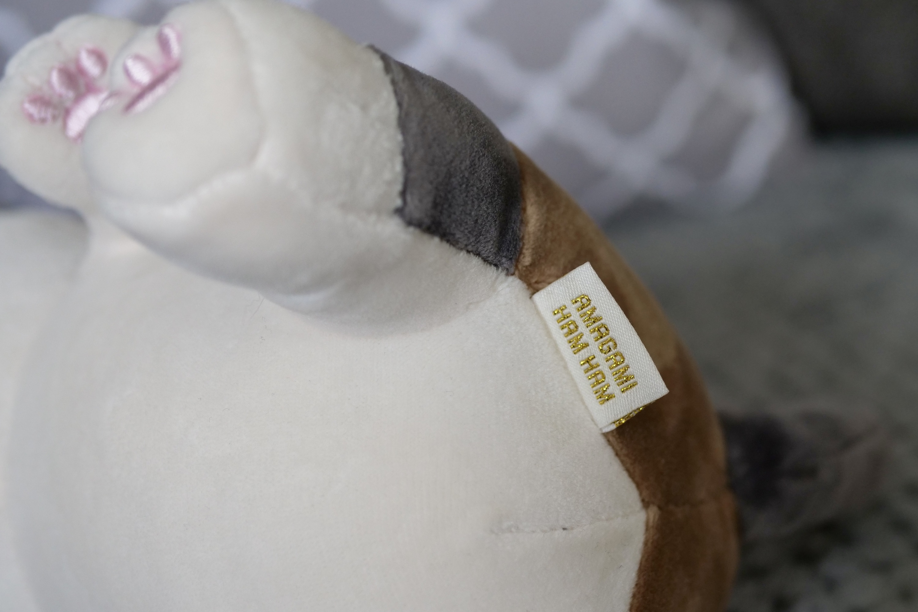 The tag on an Amagami Ham Ham robot.