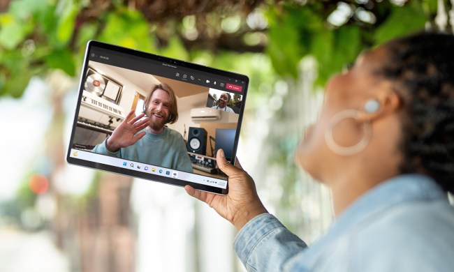 Microsoft Surface Pro 9 front view showing tablet and videoconferencing.
