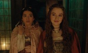 Isabela Merced stands next to Kaitlyn Dever in Hulu's Rosaline.