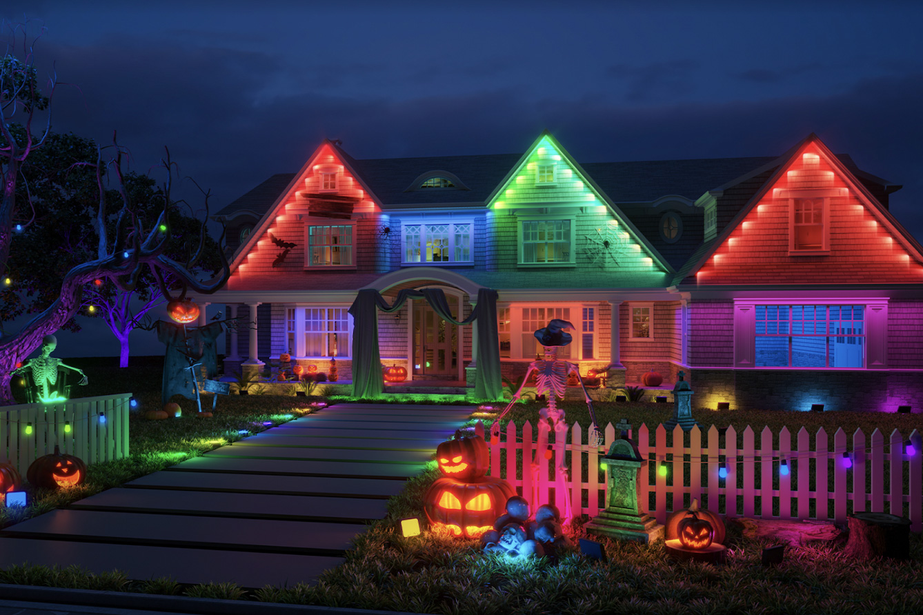 Govee Permanent Outdoor Lights strung up on a house at night for Halloween.