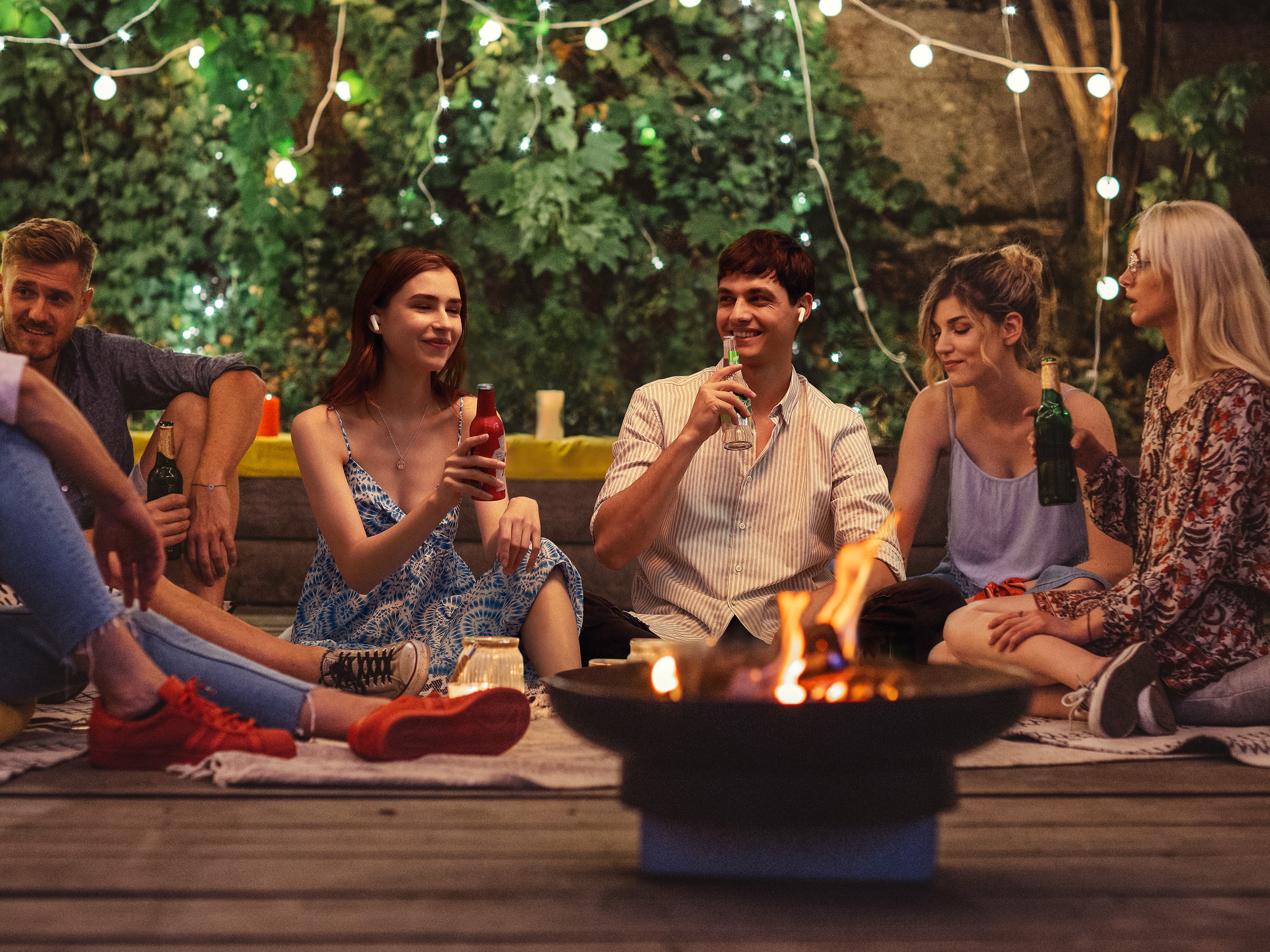 A group of people enjoy good company and beer.