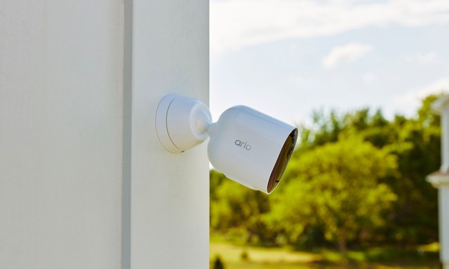 The Arlo Pro 5S installed outside on a wall.