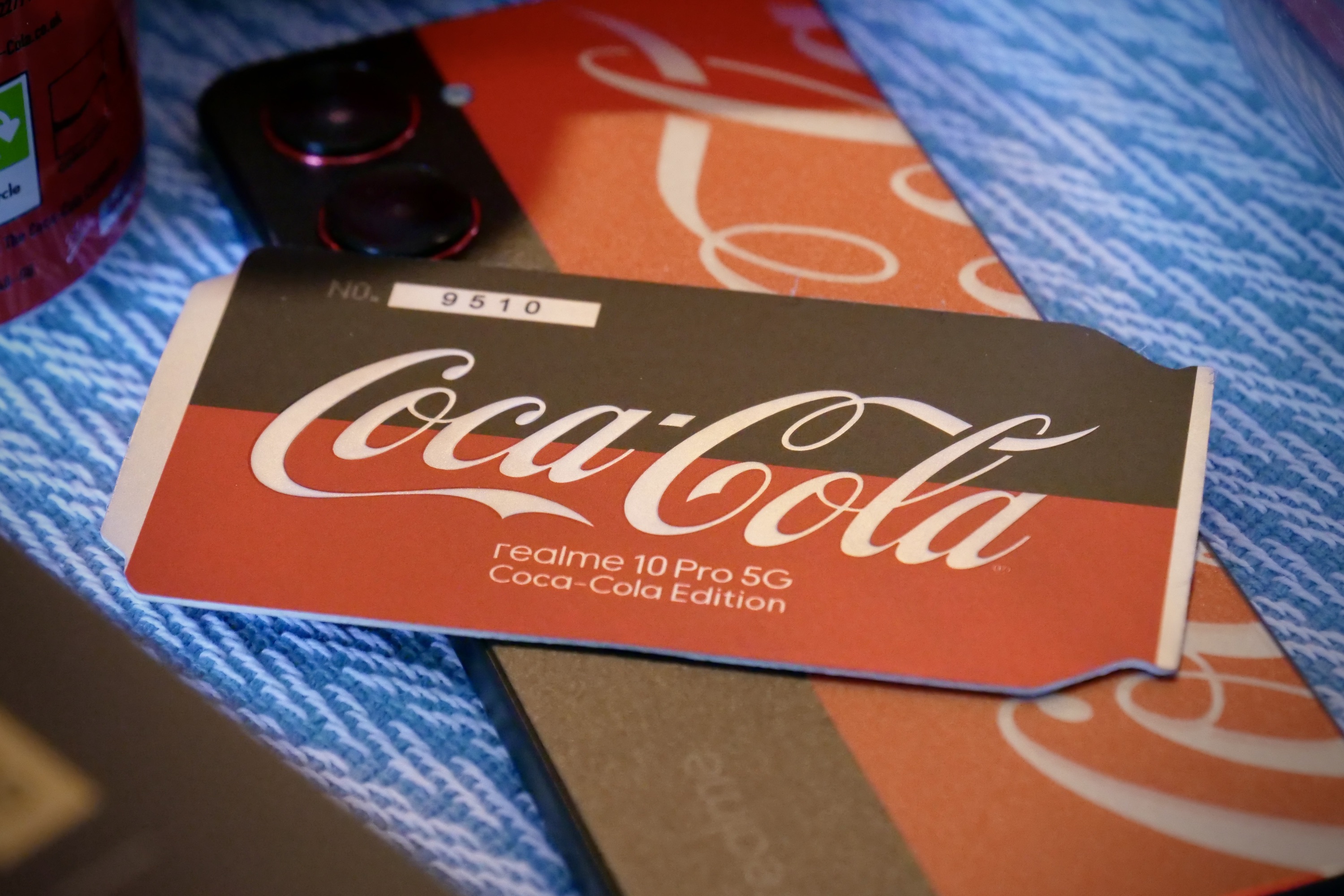 The card showing the limited edition number of the Realme X Coca-Cola phone.