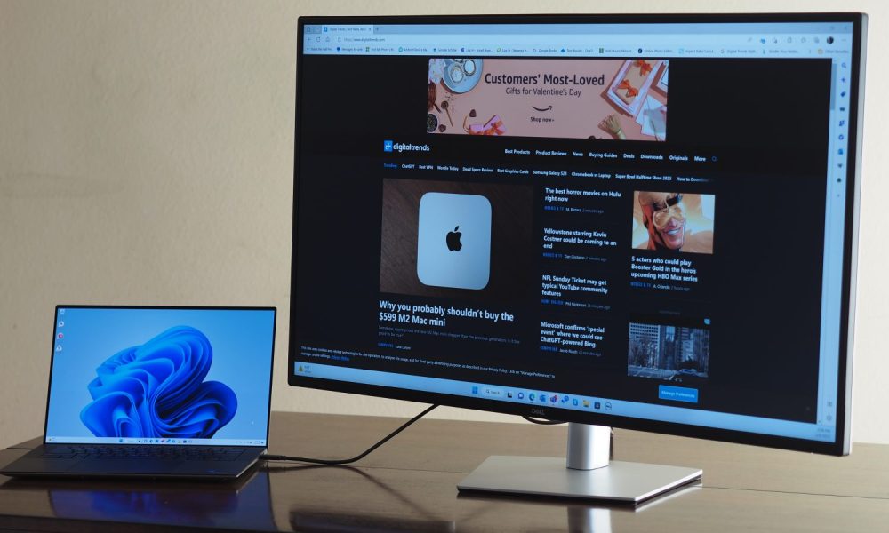 Dell UltraSharp 43 4K USB-C Hub monitor showing display and laptop.