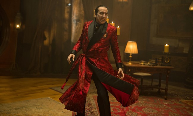 Nicolas Cage spins around in a red robe in Renfield.