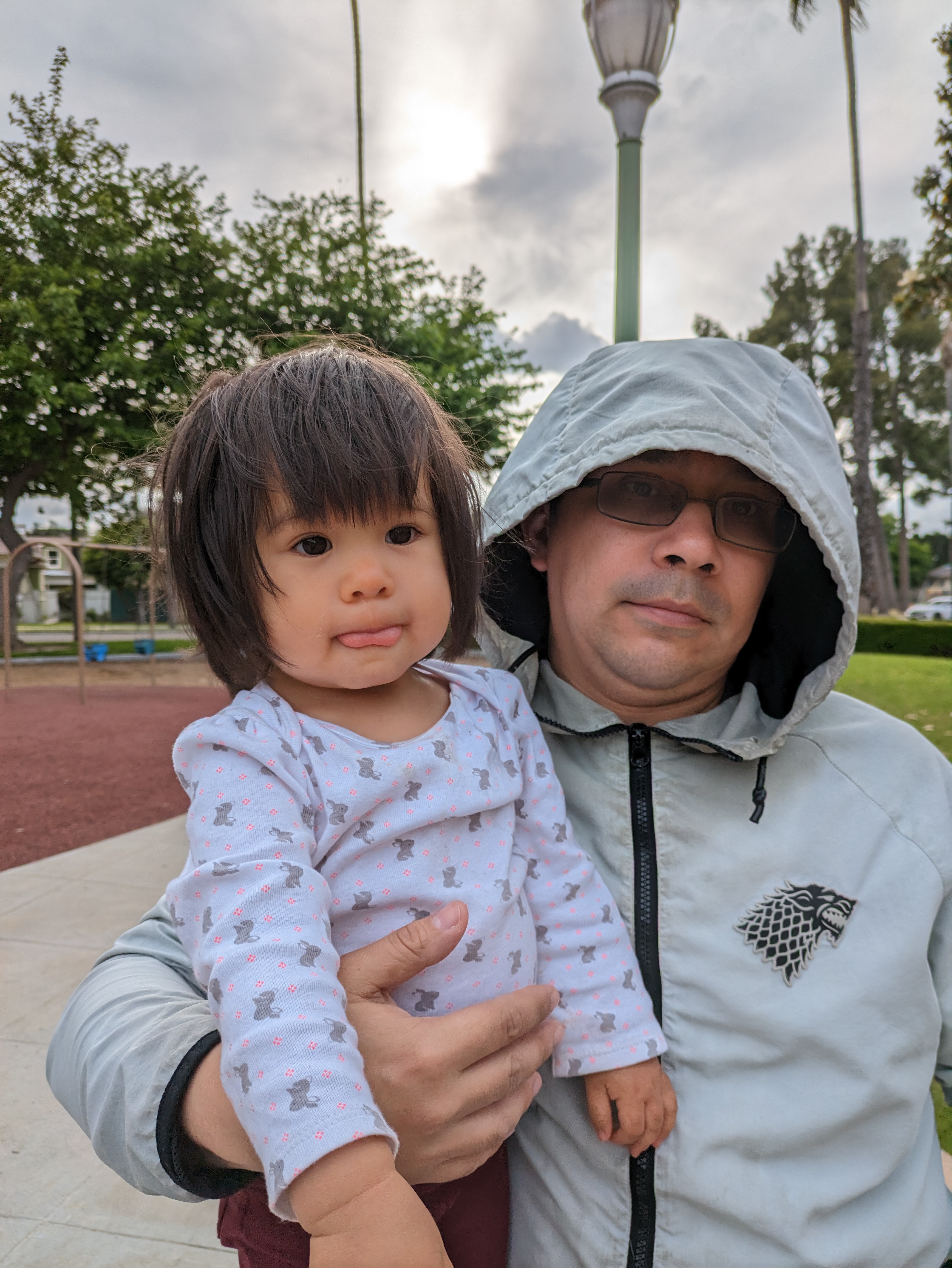 Photo of dad and toddler daughter taken with Google Pixel 7a