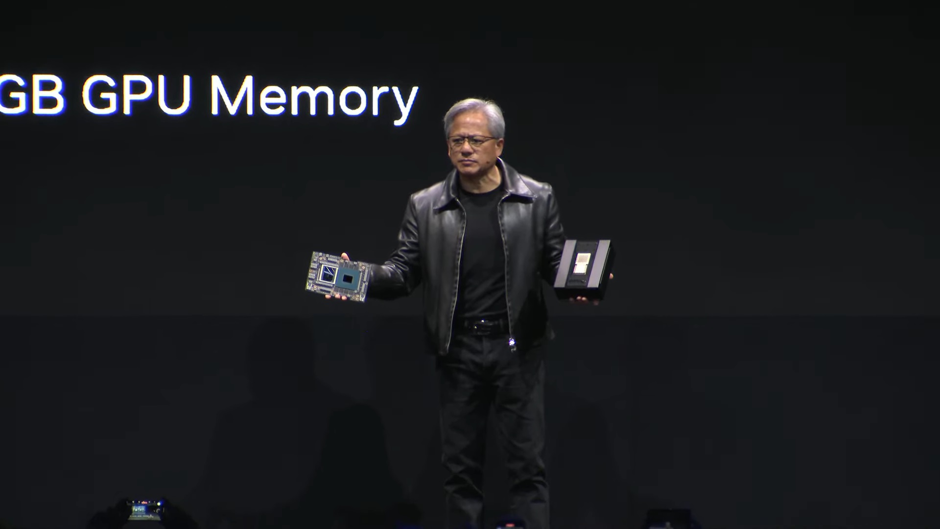 Nvidia's CEO showing off the company's Grace Hopper computer.