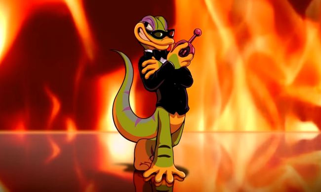 Gex holding a remote in the Gex Trilogy's reveal trailer.