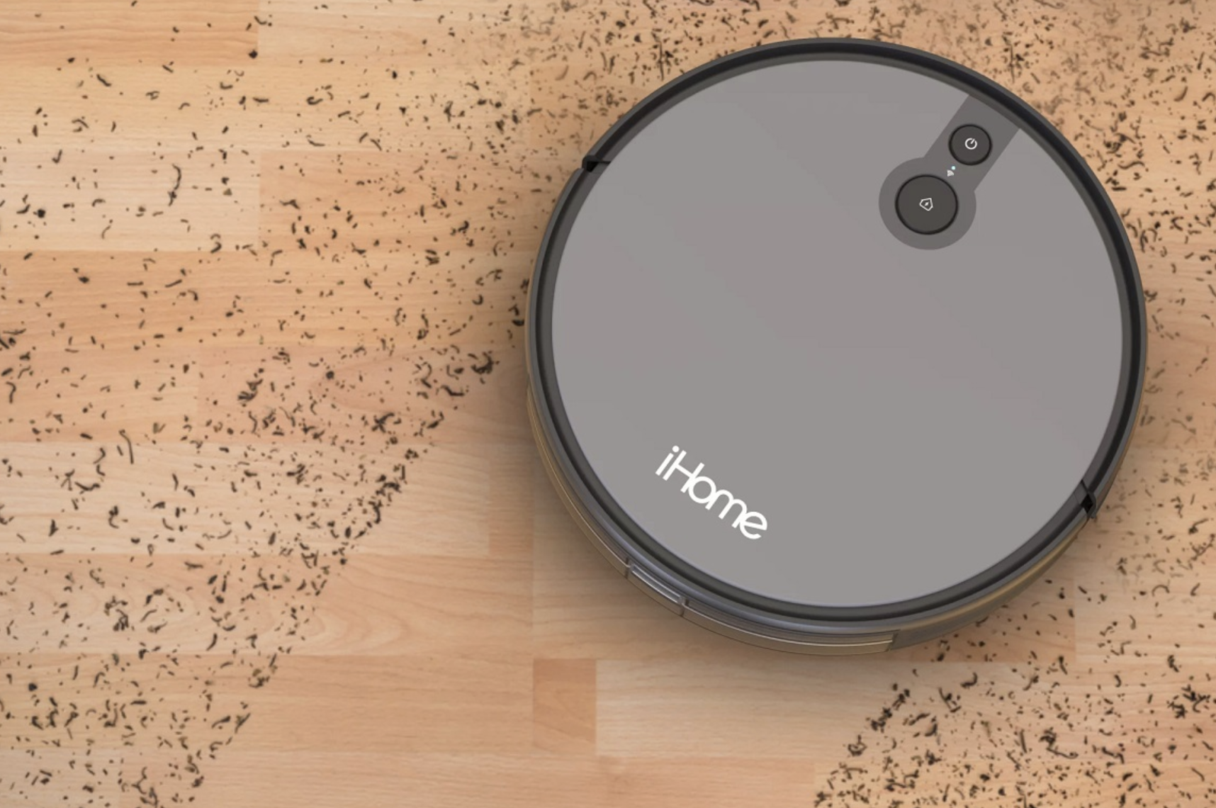 The iHome AutoVac Juno robot vacuum cleaning the floor.