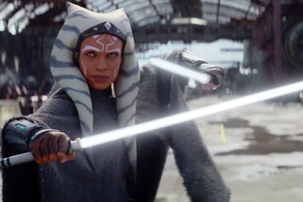 Rosario Dawson as Ahsoka dual-wielding her white lightsabers in the Disney+ series.